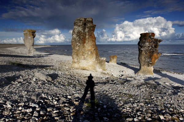 Shadows of a photographer on Raukar in Langhammars, Langhammars, Fårö, Sweden