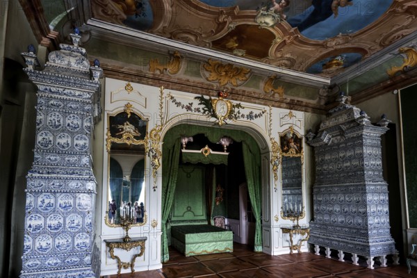 Opulent baroque decoration with tiled stove and elegant ornaments, Rundale, Latvia