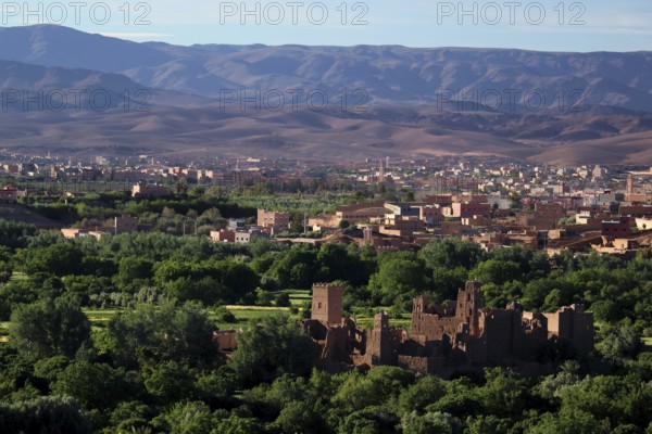 Panoramic view of the green Rose Valley with Kasbah and surrounding mountains, El Kelâa m'Gouna, Marrakesh-Safi, Morocco