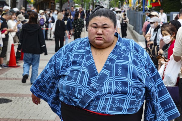 A Sumotori proud in traditional clothing in Ryogoku, Tokyo, Tokyo, Ryogoku, Japan