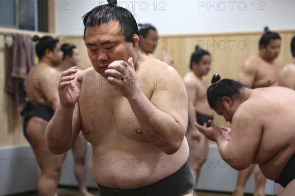 Sumo wrestler engaged in intensive training session at Sumo Center, Tokyo, Ryogoku, Japan