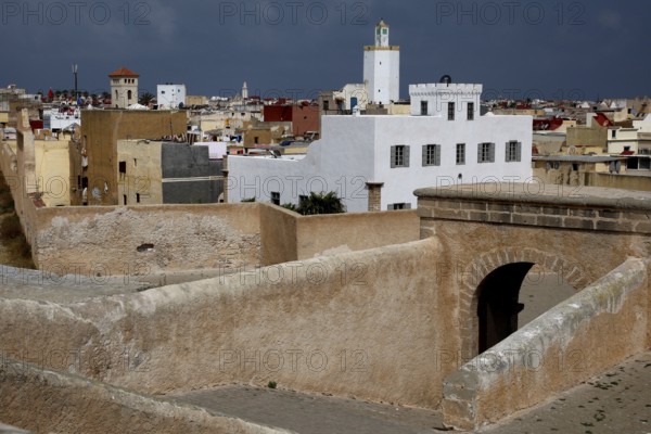 Traditional white houses and minaret within the fortress walls, El Jadida, Cité Portugaise, Morocco
