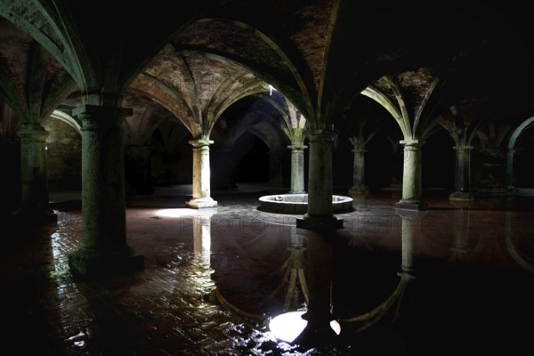 Dark cistern with gothic arches and reflecting water surfaces in El Jadida, El Jadida, Casablanca-Settat, Morocco