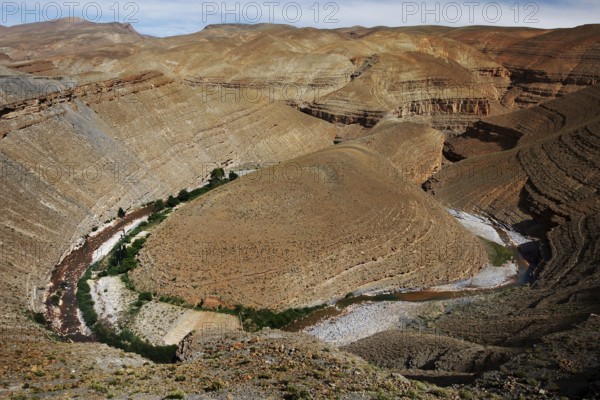 Impressive geological formations in the Dadès Canyon with a river, Dadès Gorge, Morocco