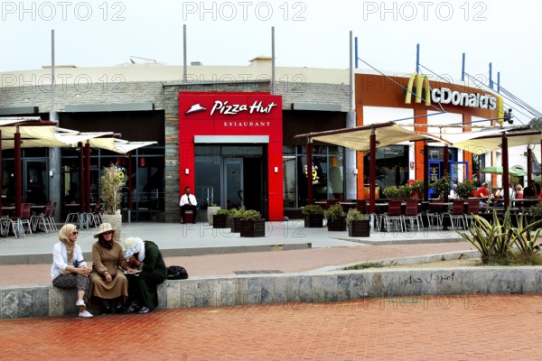 Fast-food restaurants such as McDonald's and Pizza Hut on the seafront in Agadir, Agadir, Morocco