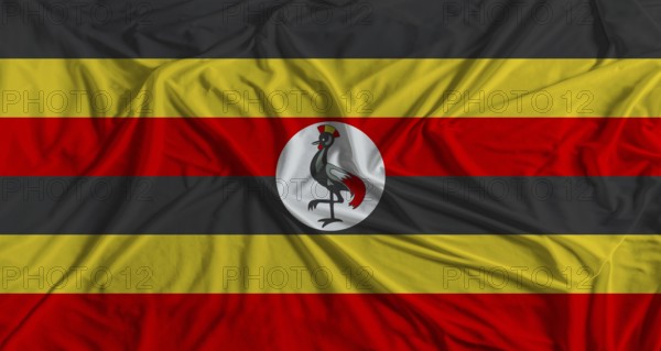 Uganda flag with fabric texture background. National flag of Uganda with cloth texture