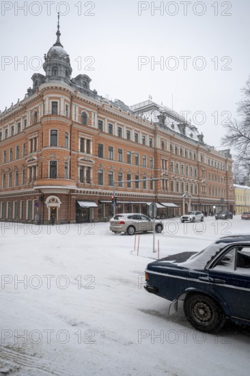 Historic building on the corner of Linnankatu Aurakatu, snowy roads, Turku or Swedish Åbo, Varsinais-Suomi, Finland