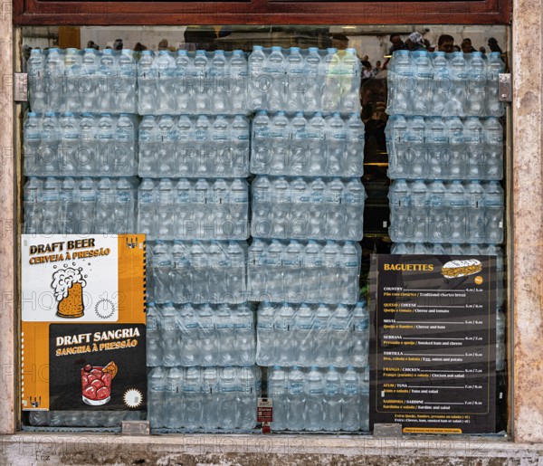 Stacks of seltzer bottles in a bar window, Sintra, Lisabon, Portugal