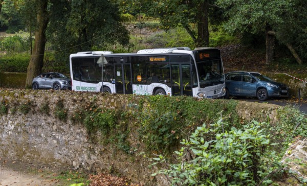 Public bus to Monserrate on a narrow street in Sintra, Lisbon, Portugal