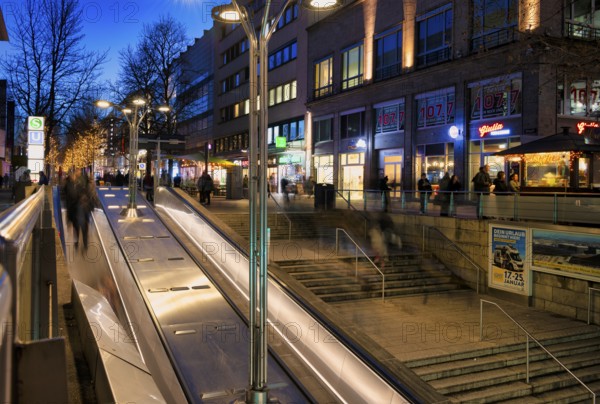 Night view, escalator, staircase, conveyor belt, city, staircase to the pedestrian zone, Königsstraße, passers-by, movement effect, Stuttgart, Baden-Württemberg, Germany