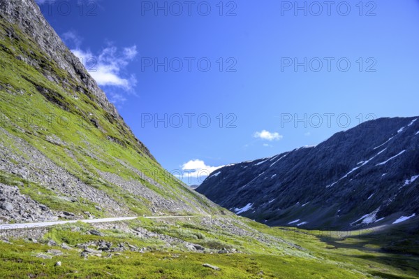 Geiranger, Møre og Romsdal province, Norway, mountain landscape with Geirangervegen road, under clear blue sky
