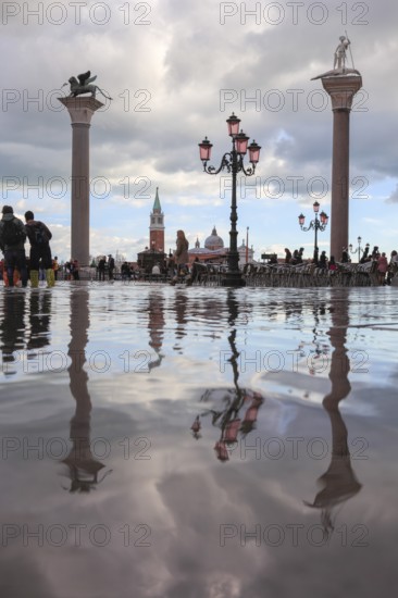 The pillars of Piazzetta, St. Mark and St. Theodorus, at high tide, Acqua Alta, San Marco, Venice, Veneto, Italy