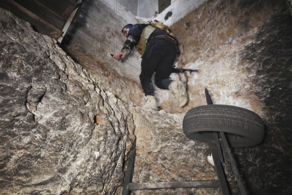 In Aleppo, Syria on January 10, 2026, members of the Syrian Army inspect underground tunnels previously used by SDF fighters in the Sheikh Maqsoud neighborhood following the halt of military operations and the evacuation of Kurdish groups towards eastern Syria, Aleppo, Sheikh Maqsood, Syria