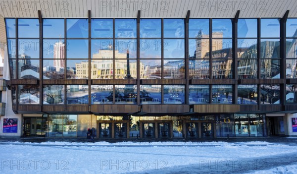 Gewandhaus façade with reflection of Augustusplatz in winter with snow, Leipzig, Saxony, Germany