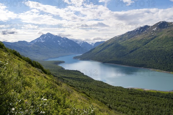 View of blue lake and mountains on Twin Peaks Trail, Eklutna Lake, Chugach Mountains, Chugach State Park, Alaska, USA