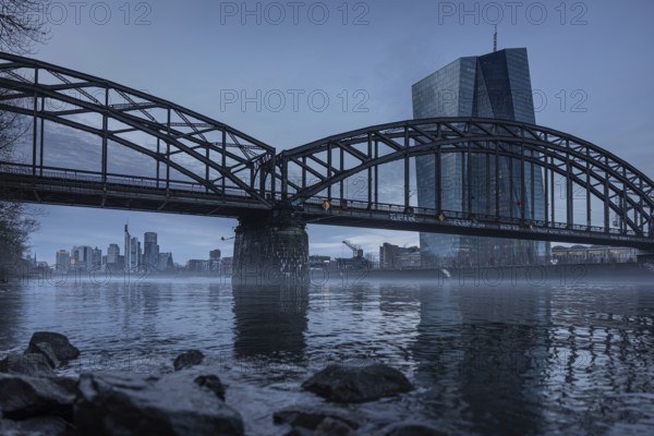 Fog drifts across the river Main in front of the European Central Bank (ECB) in Frankfurt, Osthafen, Frankfurt am Main, Hesse, Germany