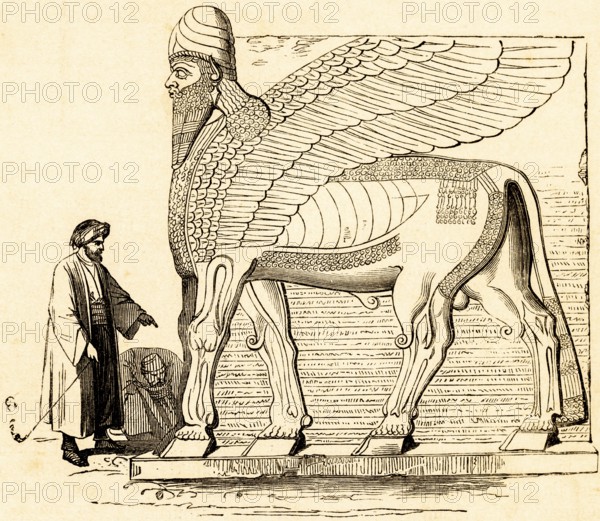 Winged portal figure from Nimrud, bull with human head and wings, pre-Christian founding of the city, capital of the Assyrian Empire, ancient Oriental ruins near Mosul, excavations, Iraq, historical illustration 1869