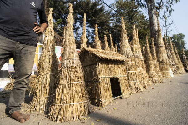 Vendor selling Meji (Bonfite), as part of preparations ahead of the 'Magh Bihu' festival, in Guwahati, Assam, India on January 12, 2026. Magh Bihu, also called Bhogali Bihu, is Assam's harvest festival marking the end of the agricultural season and celebrated with feasts, community bonfires, and traditional food