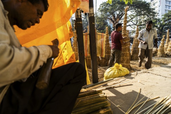 Vendor prepare Meji (Bonfire) for sell, as part of preparations ahead of the 'Magh Bihu' festival, in Guwahati, Assam, India on January 12, 2026. Magh Bihu, also called Bhogali Bihu, is Assam's harvest festival marking the end of the agricultural season and celebrated with feasts, community bonfires, and traditional food
