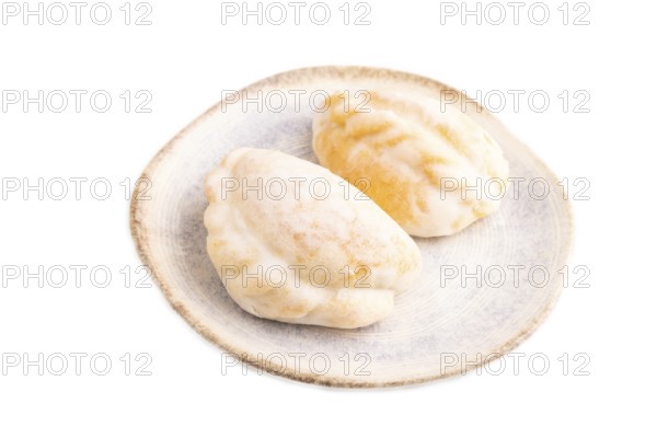 Glazed Pies with blueberry jam Isolated on white background, side view, close up