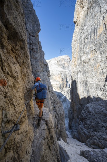 Climbers on the Via Ferrata Bocciere Centrale via ferrata, spectacular mountain landscape with steep rock faces, Brenta Mountains, Parco Naturale Brenta-Adamello, Trentino, Italy