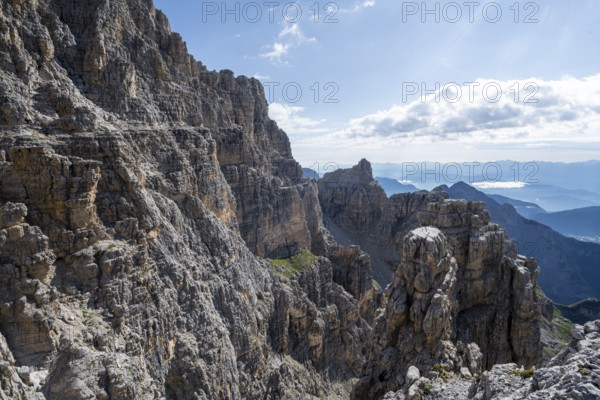 Spectacular mountain landscape with steep cliffs and rock towers, Via Ferrata Bocciere Centrale via ferrata, Brenta Mountains, Parco Naturale Brenta-Adamello, Trentino, Italy