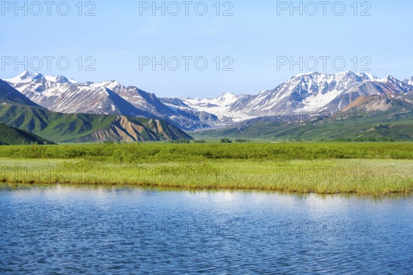 Lake and picturesque mountain landscape with Gulkana glacier and summit Icefall Peak, Richardson Highway, Alaska Range, Alaska, USA