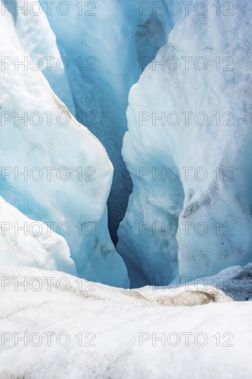 Waterfall in a crevasse on the ice of Root Glacier, Wrangell St. Elias National Park, Alaska, USA