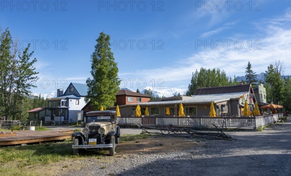 Vintage car and historic building, McCarthy, Wrangell St. Elias National Park, Alaska, USA