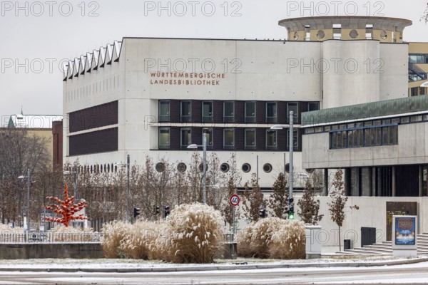 Winter in Stuttgart. There is a closed blanket of snow in the city center. Württembergische Landesbibliothek. 'Red Tree' artwork by Mariella Mosler. Stuttgart, Baden-Württemberg, Germany
