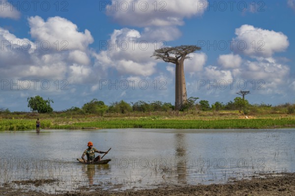 Boaters in a small lake on Baobab Alley in western Madagascar