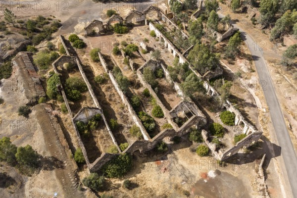 Ruins of former workshop halls, Mina de Sao Domingos, historic copper open-pit mine, aerial view, Portugal