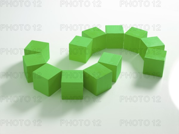 12 green wooden cubes against a white background