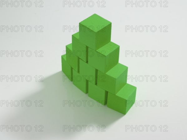 10 green wooden cubes against a white background