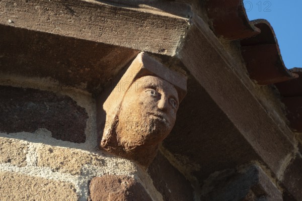Azerat village. Sculpture of Roman church Saint-Jean-Baptiste . Haute Loire. Auvergne Rhone Alpes. France