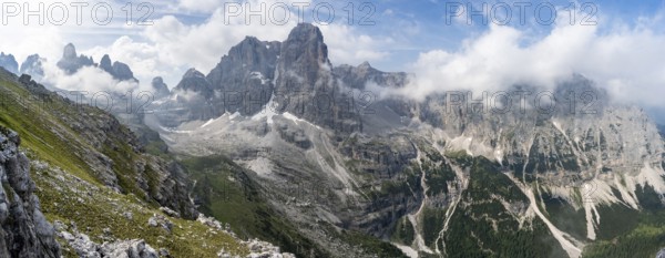 View of picturesque mountain landscape with rocky peaks, Cima Tosa peaks in the back, Via Ferrata SOSAT via ferrata, Brenta Mountains, Trentino, Italy