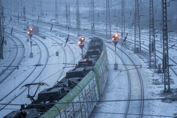 Winter weather, snowfall, regional train train, regional traffic, on the route east, in front of Essen main station, regional transport North Rhine-Westphalia, Germany