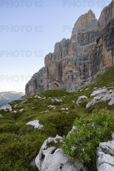 Chapel Cappella Ai Brentei Memorial for injured mountaineers at the Rifugio Ai Brentei mountain hut, picturesque mountain landscape in the morning, Brenta, Trentino, Italy
