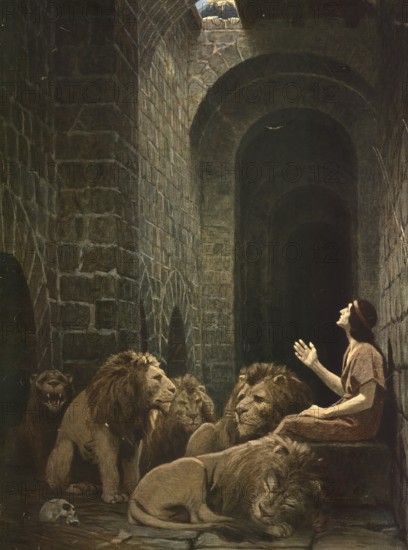 Scene from the biblical story, Daniel in the lion's den, well-known biblical story in which the prophet Daniel is slandered by envious court officials and thrown into a pit with hungry lions as punishment for continuing to pray to his god, authentic reproduction of a school mural, historical, around 1900