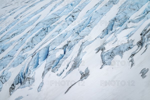 Blue rugged glacier ice with crevasses and snow, detail, Exit Glacier, Kenai Peninsula, Alaska, USA