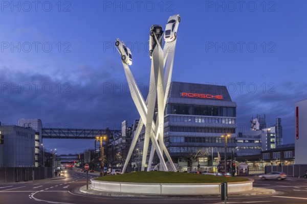 Inspiration 911 artwork by Gerry Judah in front of the Porsche headquarters on Porscheplatz: three steles, each presenting a Porsche 911 at a height of up to 24 meters. Stuttgart, Baden-Württemberg, Germany