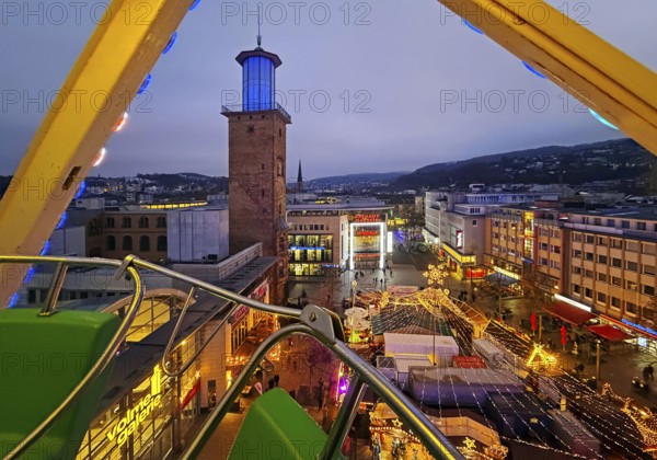 View of the town hall tower with the Christmas market from a Ferris wheel gondola, Hagen, Ruhr area, North Rhine-Westphalia, Germany