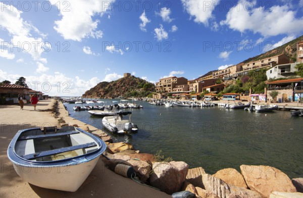 Boats in Port de Porto or Port of Porto on the Porto River, behind the Genoese Tower, Porto, Ota, west coast of Corsica, Corse-du-Sud, Corsica, France