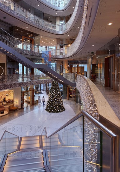 Stilwerk Düsseldorf, interior view, Christmassy decorated elliptical atrium with surrounding galleries in five sales floors, Germany