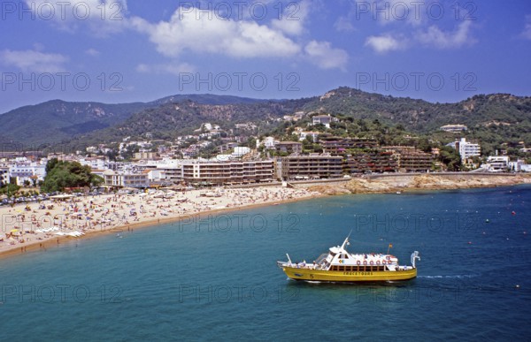 Excursion boat on Tossa de Mar beach, Costa Brava, Spain, June 1999, vintage, retro, old, historic