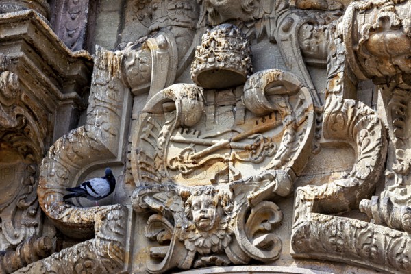 Highly detailed stone façade with a dove, reliefs on the Basilica of St. Francis in Lima in Peru