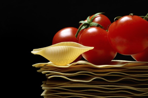 Lasagna leaves and conchiglione noodle with tomatoes, pasta