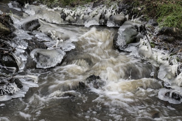 Natural ice sculptures on a stream, Emsland, Lower Saxony, Germany
