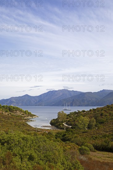 Sailing boat in the Mediterranean, Gulf of Saint-Florent, in front of the Agriates Desert or Agriates Desert, Haute-Corse, Corsica