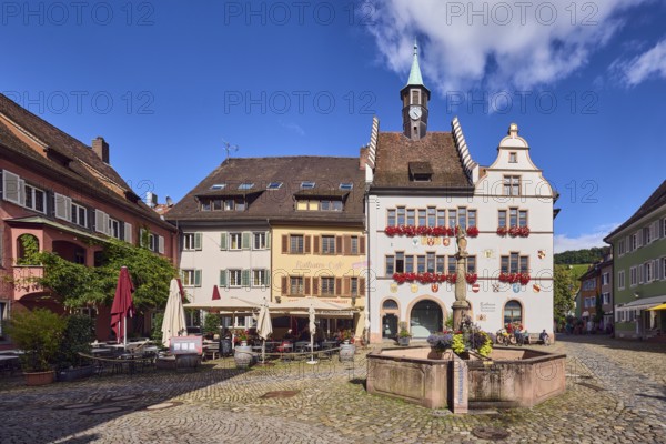 Historic town hall, market fountain, general architecture, historic buildings, houses, town hall café, cobblestone square, blue sky, cumulus clouds, intersection of main street with Kirchstraße, Staufen im Breisgau, Black Forest, Breisgau-Hochschwarzwald district, Baden-Württemberg, Germany